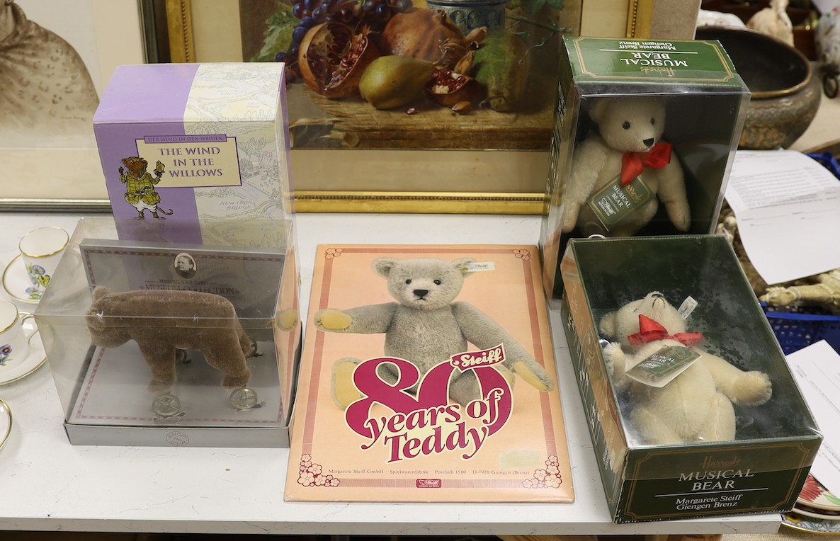 Three modern Steiff Teddy bears, and Steiff Wind in the Willows Ratty, also Steiff poster, Poster 42 cms high x 29 cms wide.